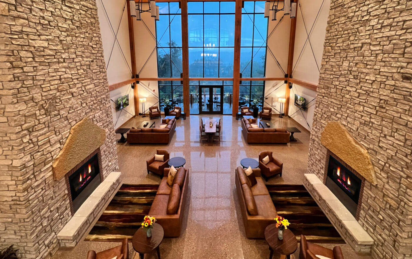 ROH New Hotel Openings: A common space with couches and fireplaces at Hocking Hills Lodge & Conference Center